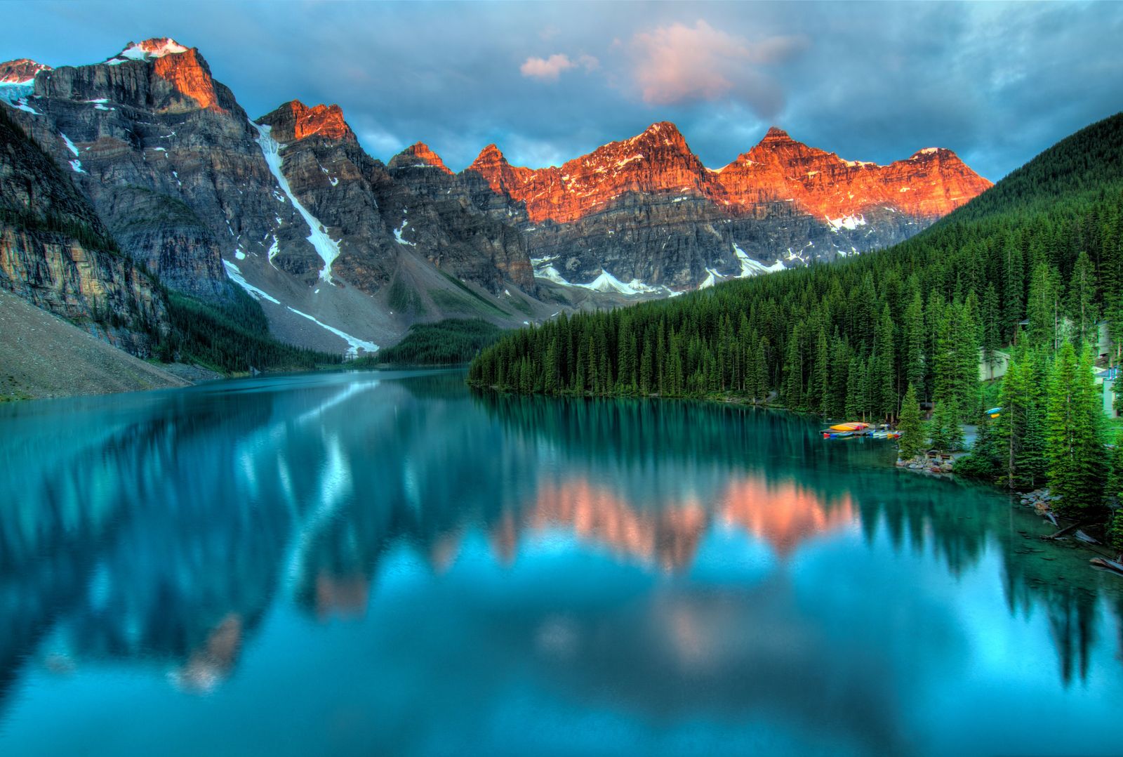 Snow-capped mountain range at golden hour